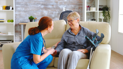 female-nurse-talking-with-old-wo (1).jpg